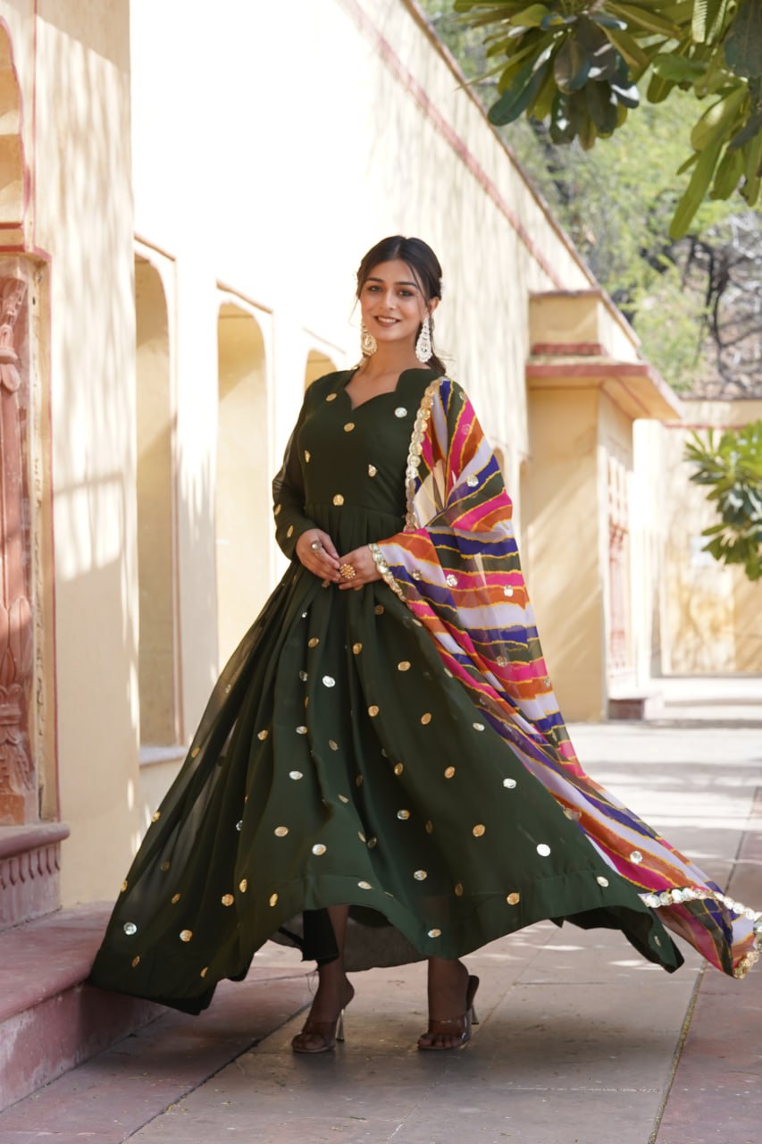 DESIGNER GREEN GOWN IS LUXURY CLOTHING CONSIDERED TO BE HIGH QUALITY MADE BY ZARI THREAD & SEQUINS EMBROIDERY