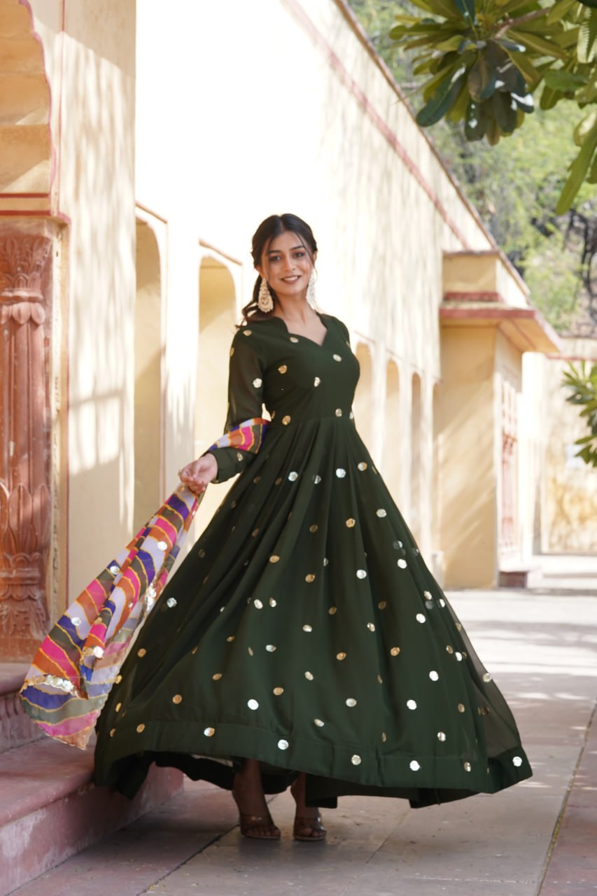 DESIGNER GREEN GOWN IS LUXURY CLOTHING CONSIDERED TO BE HIGH QUALITY MADE BY ZARI THREAD & SEQUINS EMBROIDERY