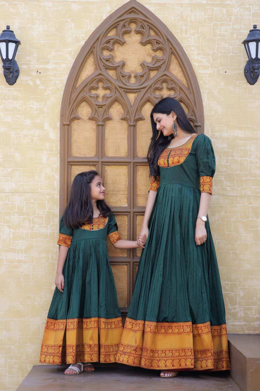 PREMIUM DESIGNER READYMADE MOM-DAUGHTER GREEN GOWN COLLECTIONS.