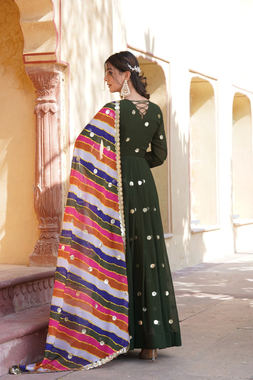 DESIGNER GREEN GOWN IS LUXURY CLOTHING CONSIDERED TO BE HIGH QUALITY MADE BY ZARI THREAD & SEQUINS EMBROIDERY