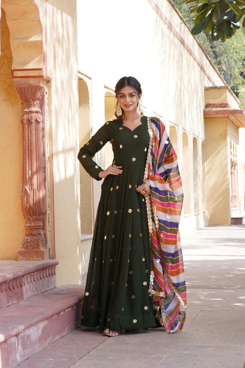 DESIGNER GREEN GOWN IS LUXURY CLOTHING CONSIDERED TO BE HIGH QUALITY MADE BY ZARI THREAD & SEQUINS EMBROIDERY